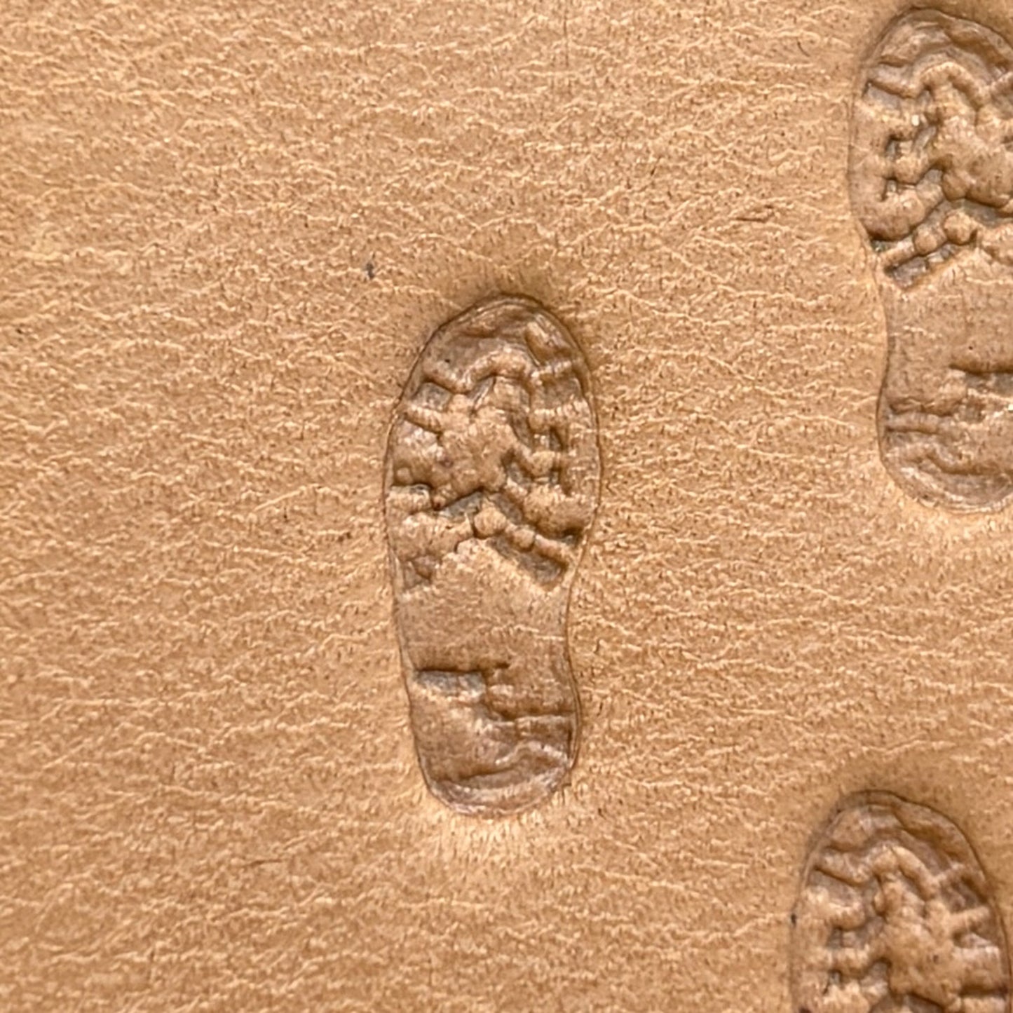 Trail Steps Footprint leather stamp LT604 — pattern imprint on veg-tan leather