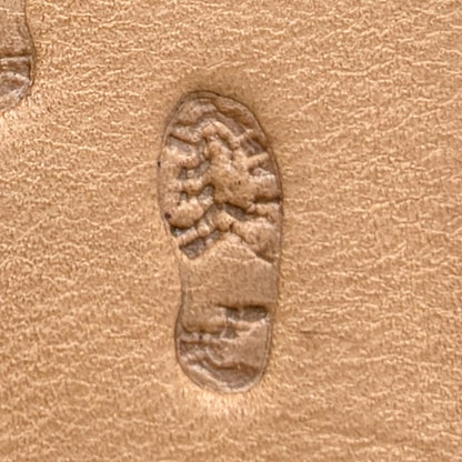 Trail Steps Footprint leather stamp LT604 — single impression on veg-tan leather
