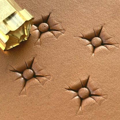 Starburst Geometric leather stamp LT608 — brass stamping tool with imprint on natural veg-tan leather