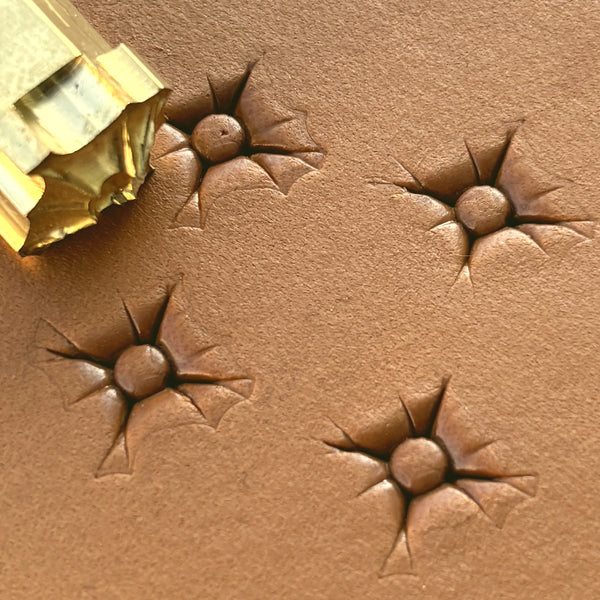 Starburst Geometric leather stamp LT608 — brass stamping tool with imprint on natural veg-tan leather