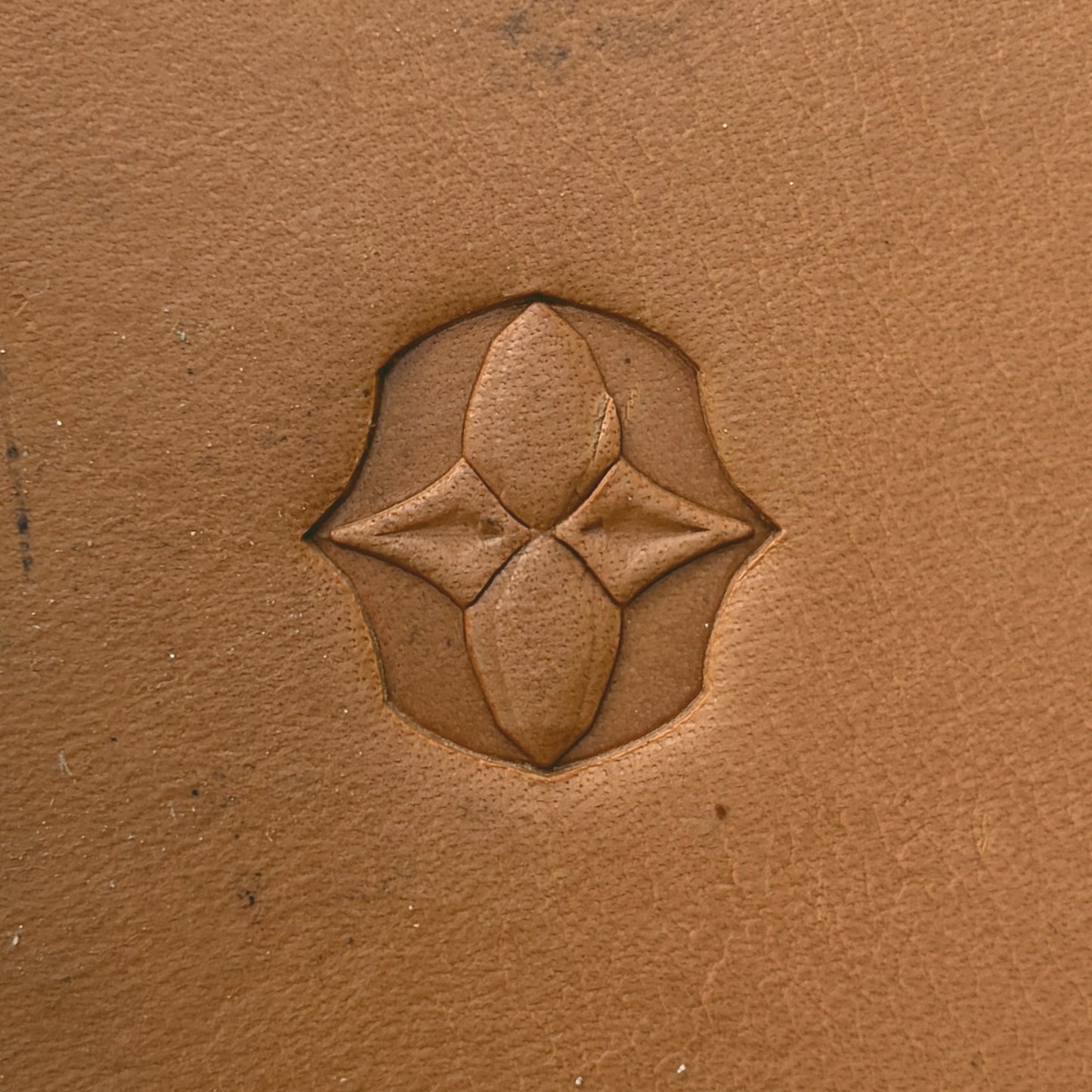 Star Cluster Geometric leather stamp LT611 — single impression on veg-tan leather