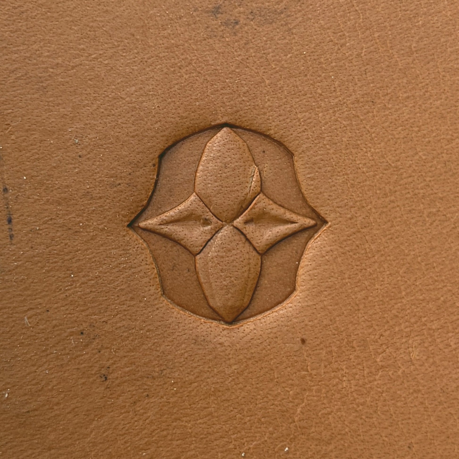 Star Cluster Geometric leather stamp LT611 — single impression on veg-tan leather