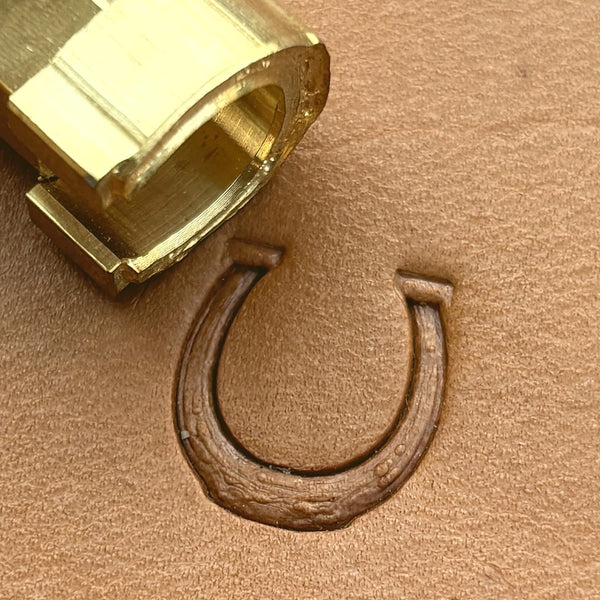 Horseshoe leather stamp LT614 — brass stamping tool with imprint on natural veg-tan leather