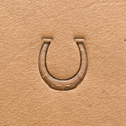Horseshoe leather stamp LT614 — single impression on veg-tan leather