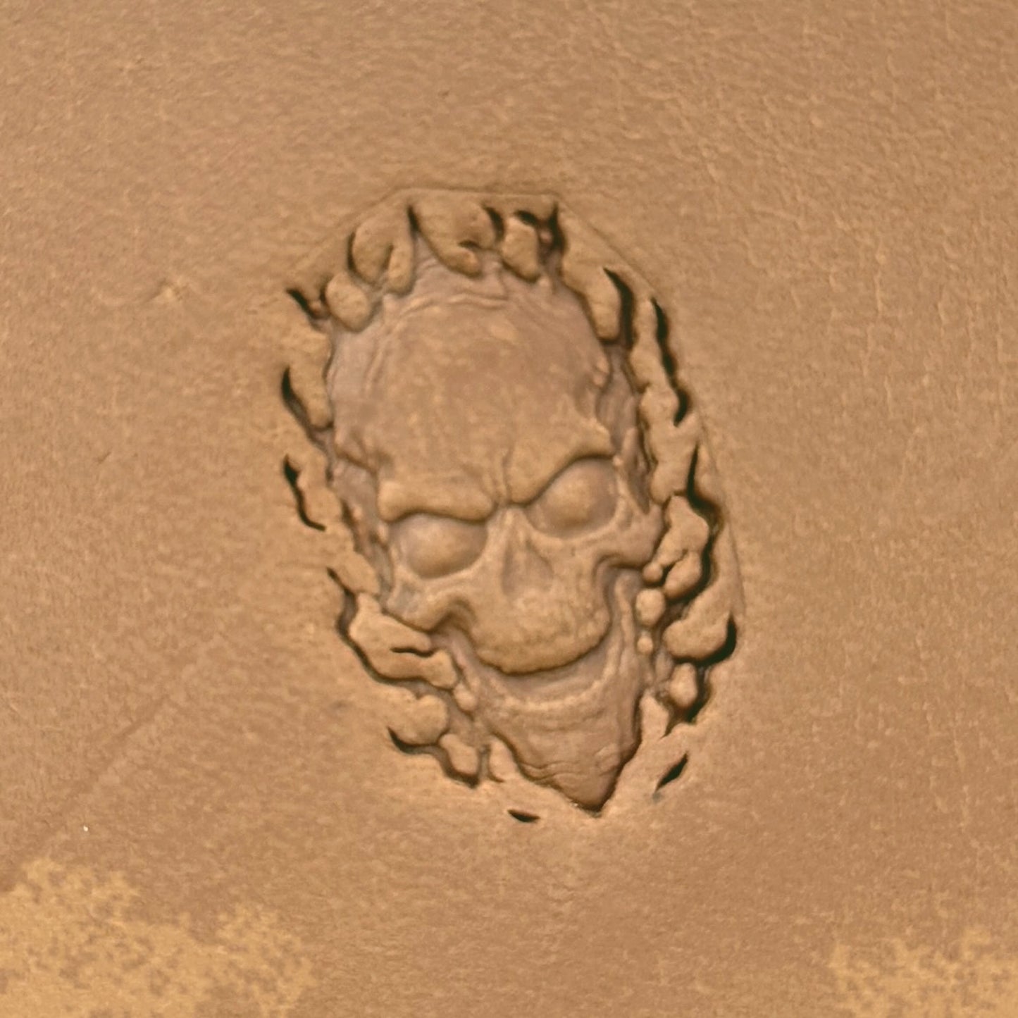 Flaming Skull leather stamp LT618 — single impression on veg-tan leather