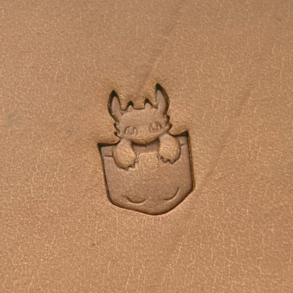 Pocket Dragon leather stamp LT619 — single impression on veg-tan leather