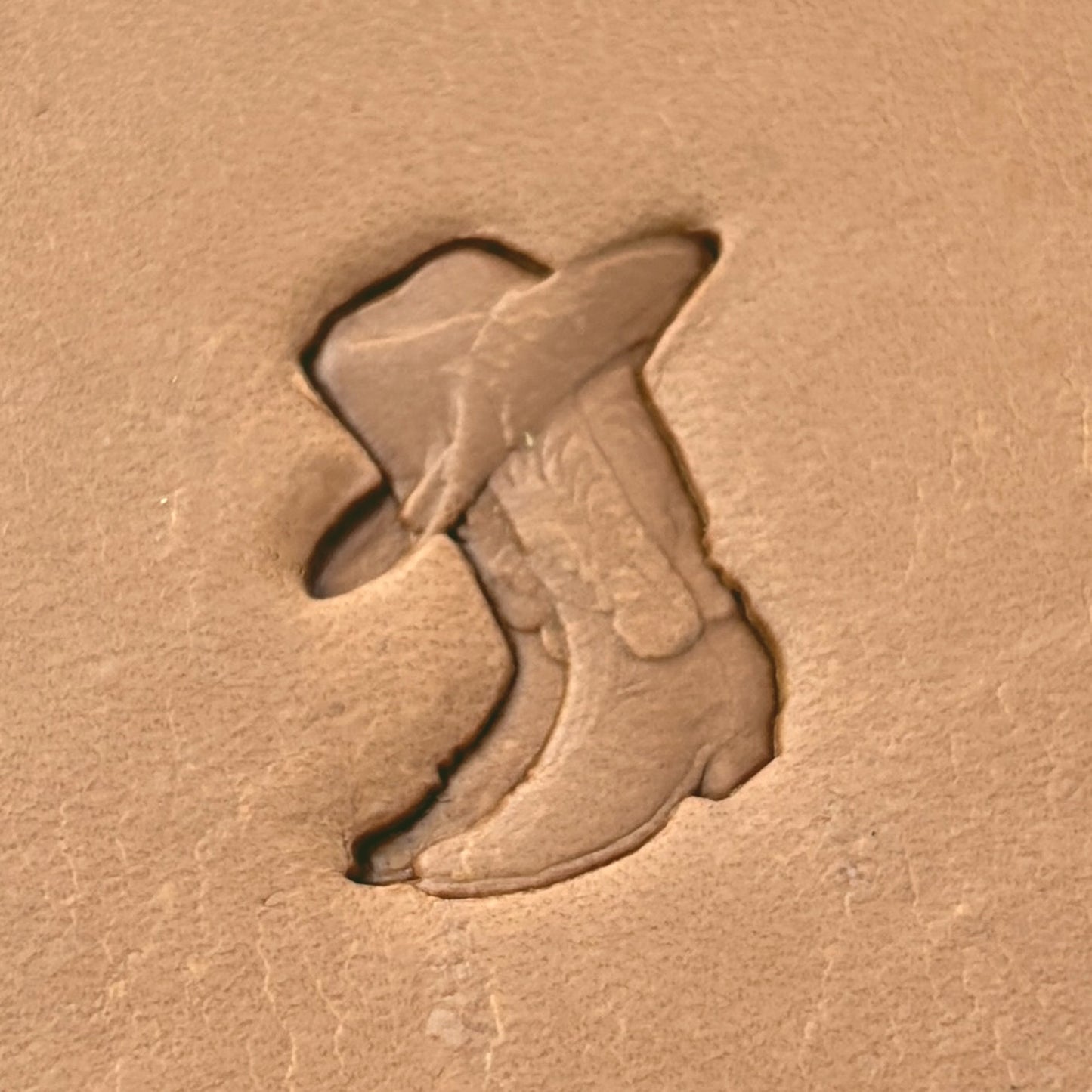Cowboy Boot leather stamp LT627 — single impression on veg-tan leather