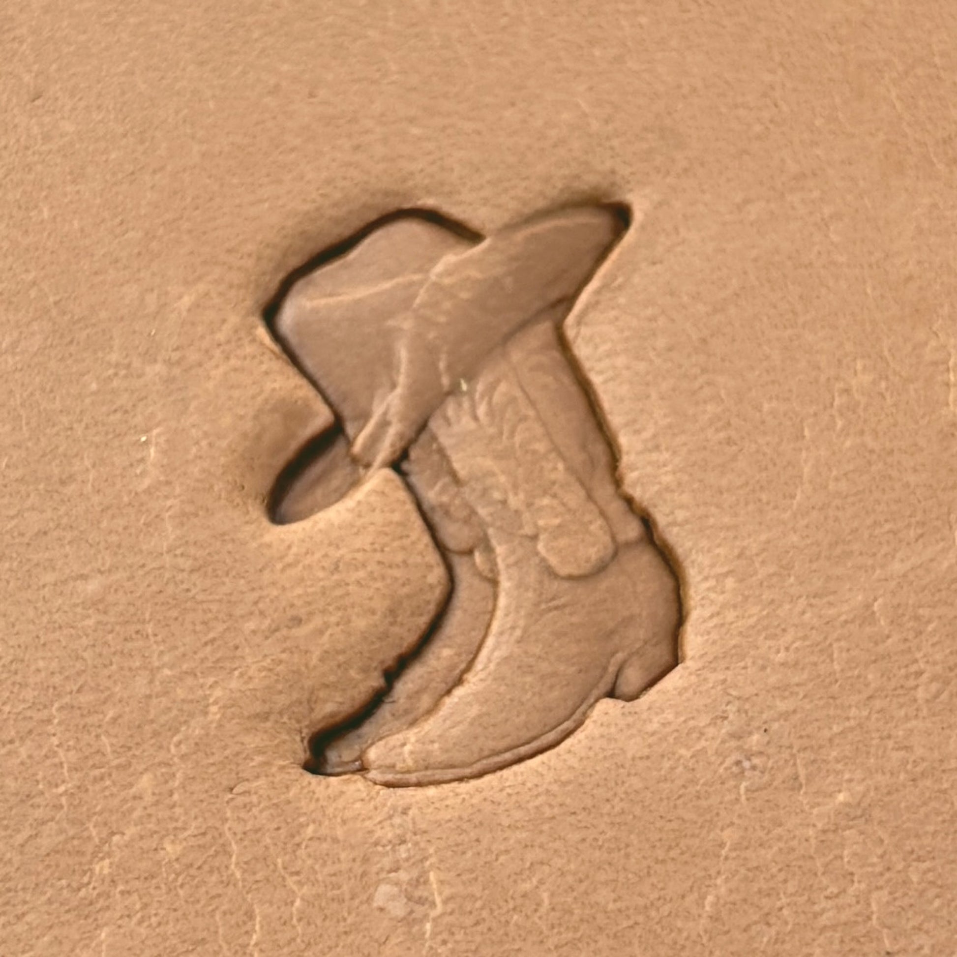 Cowboy Boot leather stamp LT627 — single impression on veg-tan leather