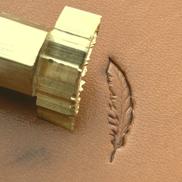 Feather leather stamp LT631 — brass stamping tool with imprint on natural veg-tan leather