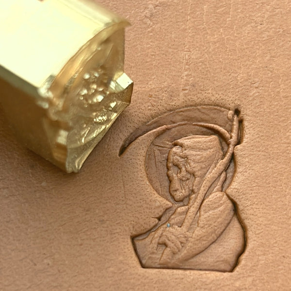 Grim Reaper Skull leather stamp LT635 — brass stamping tool with imprint on natural veg-tan leather