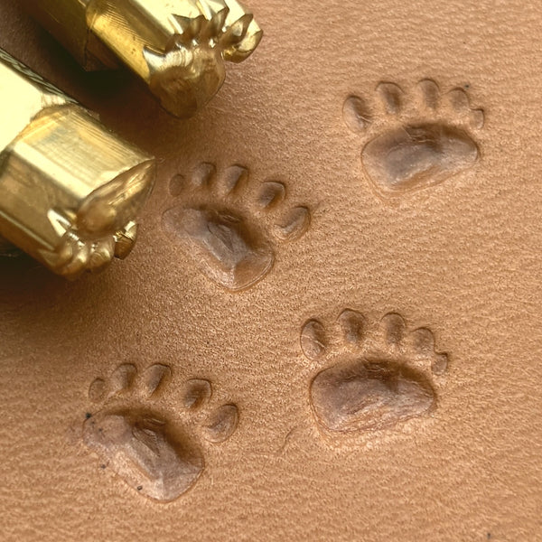 Tracks Paw Bear leather stamp LT637 — brass stamping tool with imprint on natural veg-tan leather