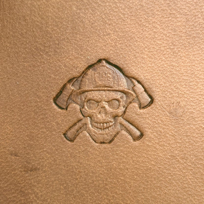Firefighter Skull leather stamp LT638 — single impression on veg-tan leather