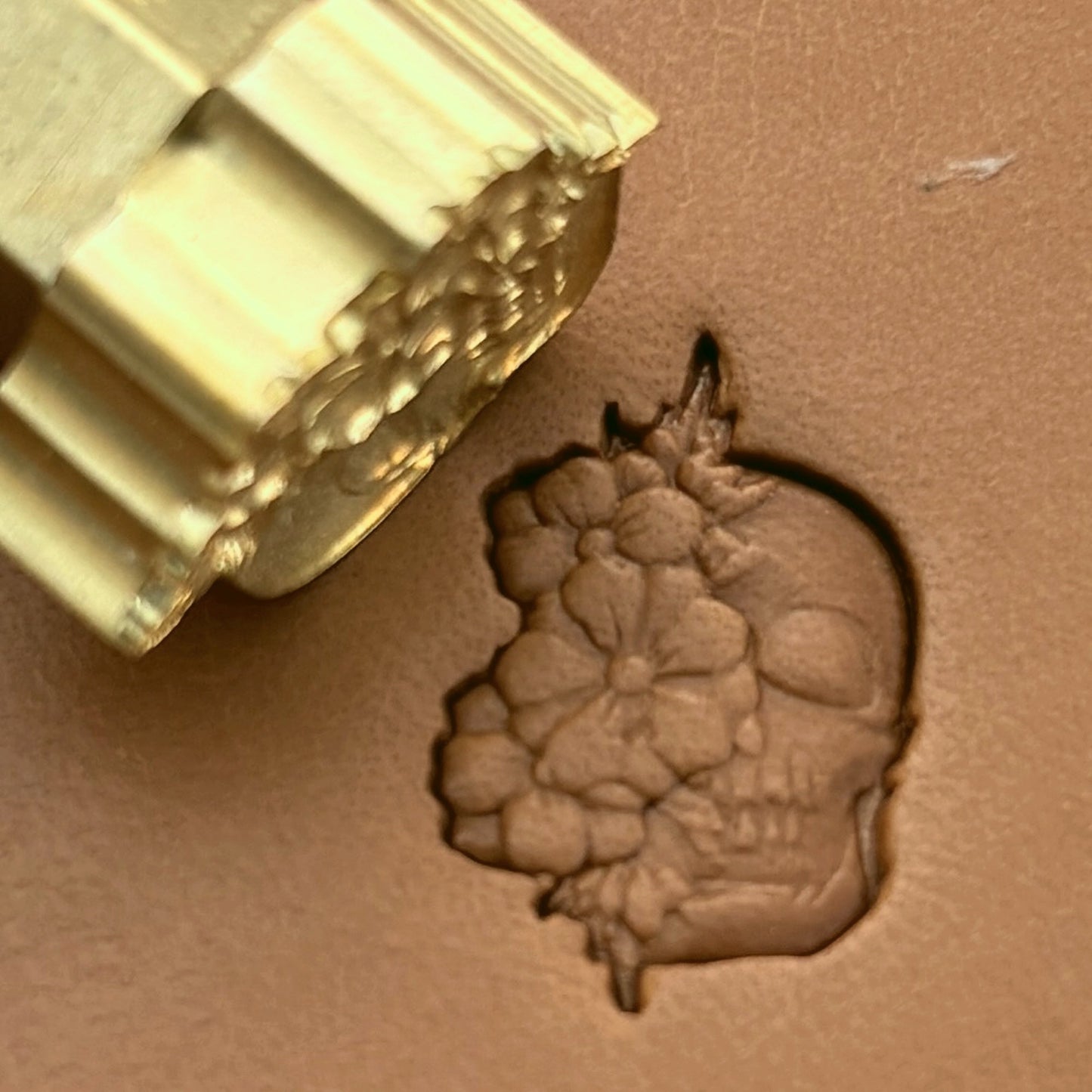 Floral Burst Skull leather stamp LT640 — brass stamping tool with imprint on natural veg-tan leather