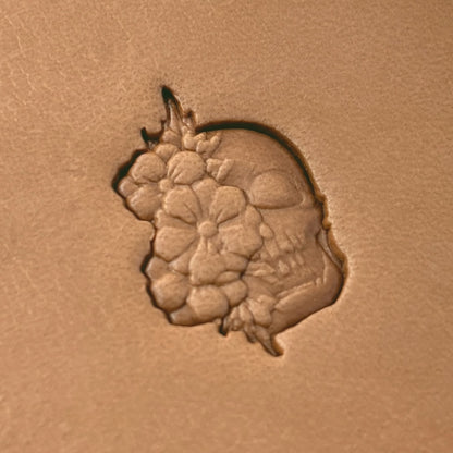 Floral Burst Skull leather stamp LT640 — single impression on veg-tan leather