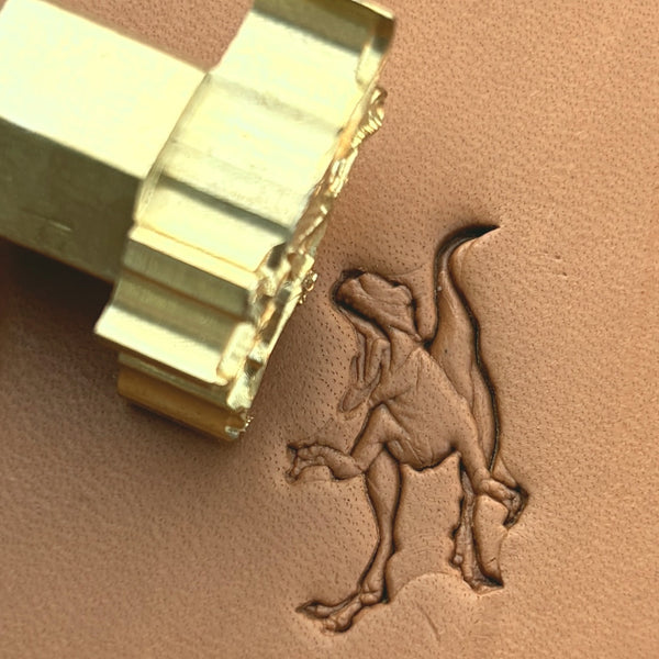 T-Rex leather stamp LT642 — brass stamping tool with imprint on natural veg-tan leather