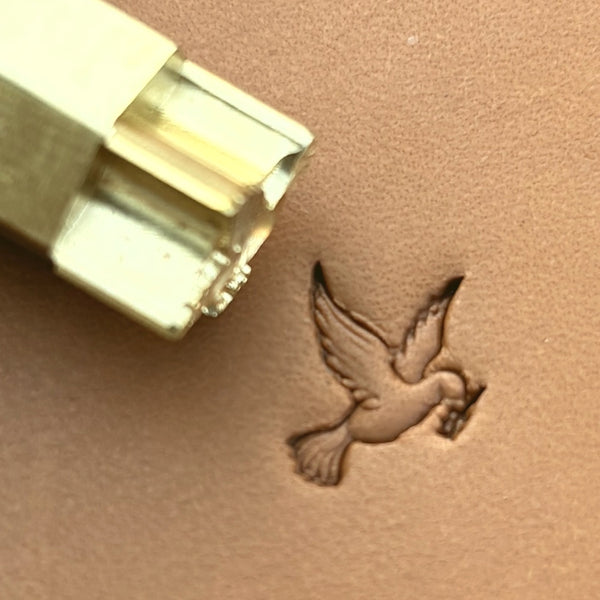 Flying Dove leather stamp LT643 — brass stamping tool with imprint on natural veg-tan leather