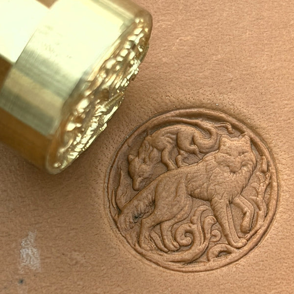 Twin Wolves Circle leather stamp LT645 — brass stamping tool with imprint on natural veg-tan leather