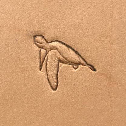 Swimming Sea Turtle leather stamp LT648 — single impression on veg-tan leather