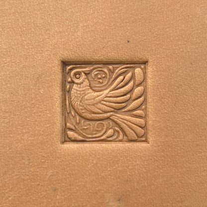 Whimsical Bird leather stamp LT652 — single impression on veg-tan leather