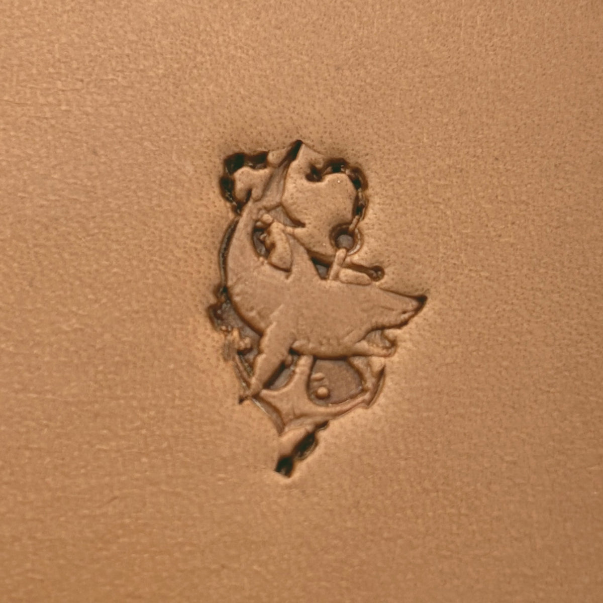 Shark leather stamp LT653 — single impression on veg-tan leather