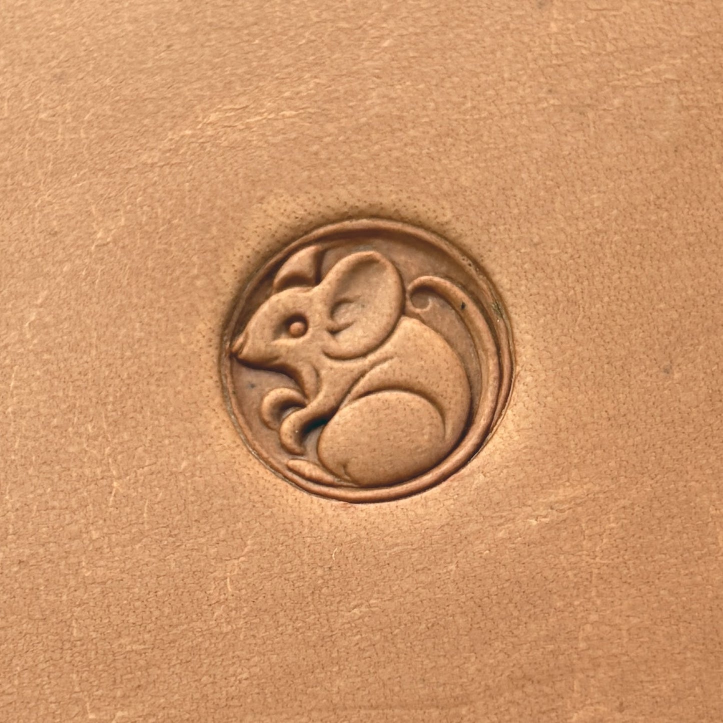 Mouse in Circle leather stamp LT658 — single impression on veg-tan leather
