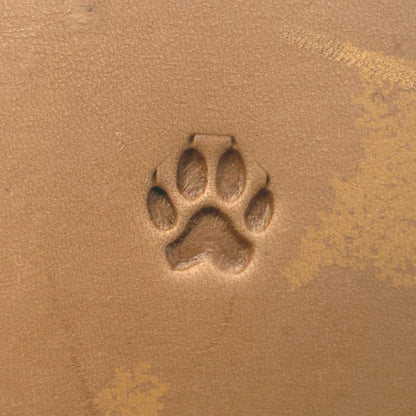 Paw Print Dog leather stamp LT659 — single impression on veg-tan leather