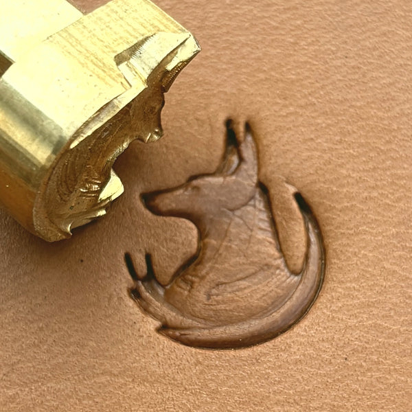 Stylized Jackal leather stamp LT666 — brass stamping tool with imprint on natural veg-tan leather