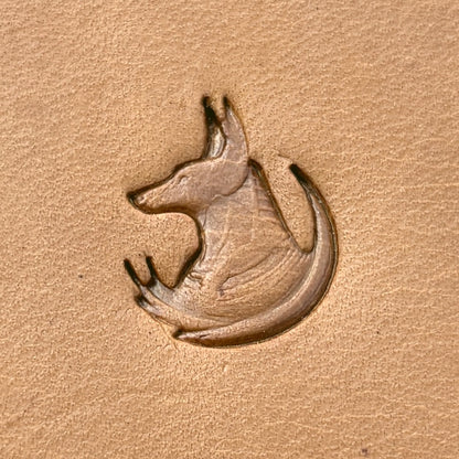 Stylized Jackal leather stamp LT666 — single impression on veg-tan leather