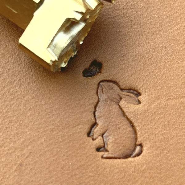Sitting Rabbit leather stamp LT690 — brass stamping tool with imprint on natural veg-tan leather