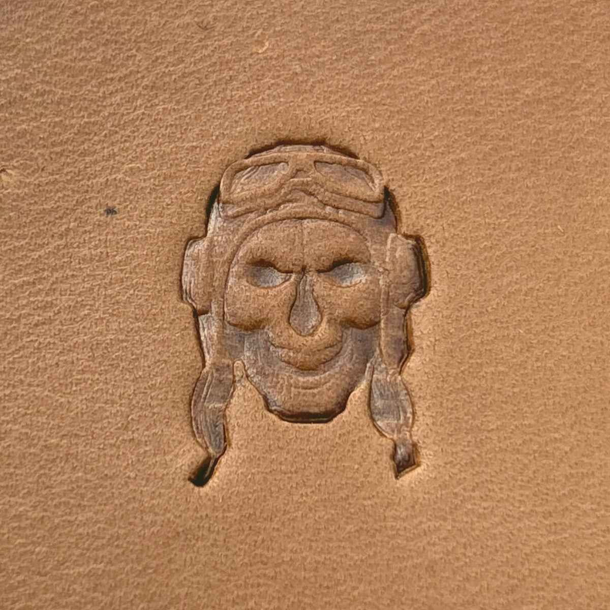Aviator Pilot Skull leather stamp LT693 — single impression on veg-tan leather