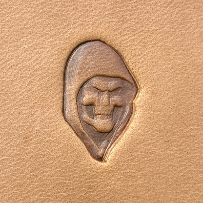 Grim Reaper Skull leather stamp LT696 — single impression on veg-tan leather