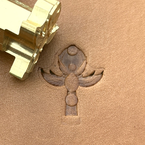 Volute leather stamp LT699 — brass stamping tool with imprint on natural veg-tan leather