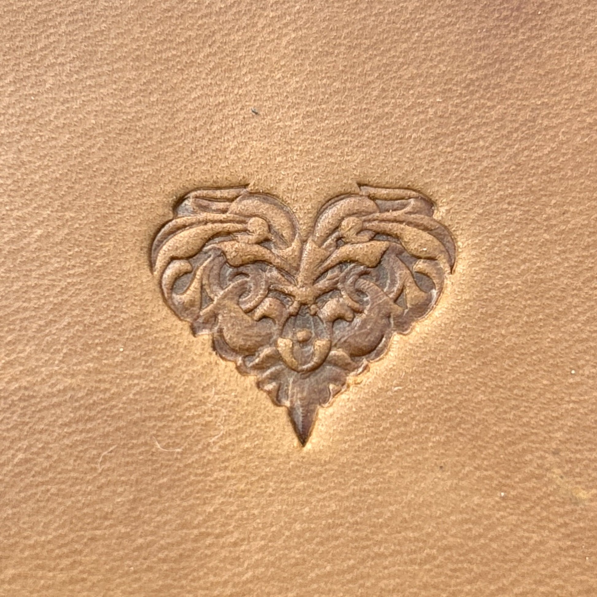 Celtic Style Heart leather stamp LT706 — single impression on veg-tan leather