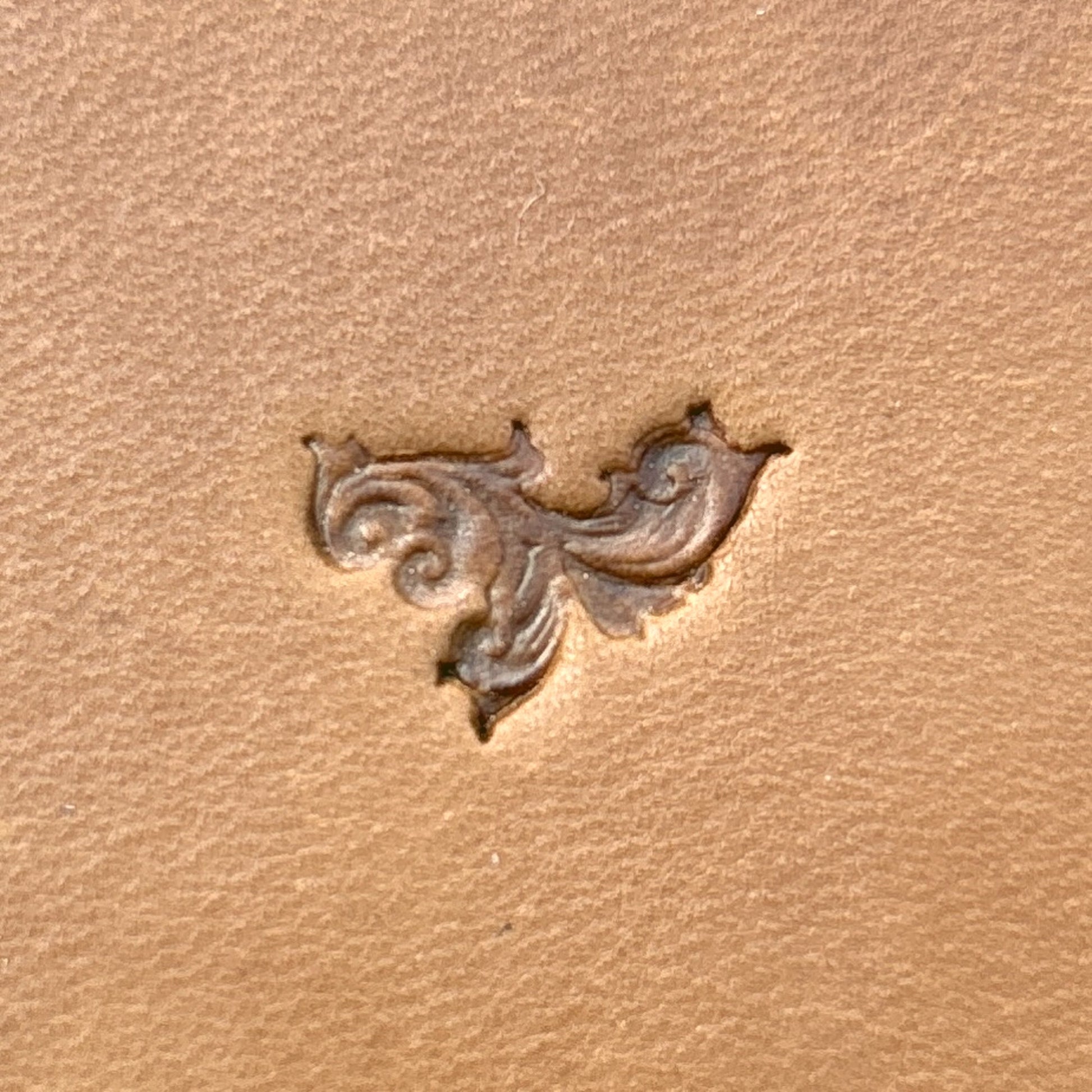 Ornate Scroll Flower leather stamp LT707 — single impression on veg-tan leather