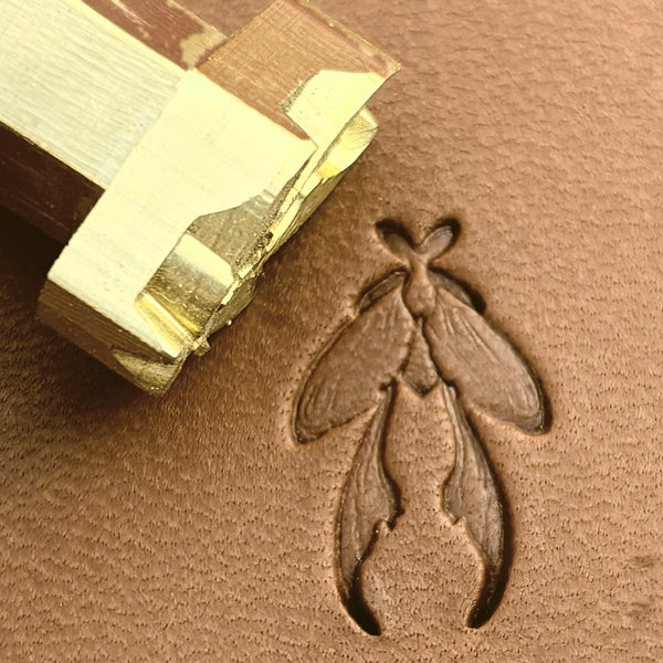 Insect Long Wings leather stamp LT709 — brass stamping tool with imprint on natural veg-tan leather