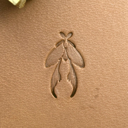 Insect Long Wings leather stamp LT709 — single impression on veg-tan leather