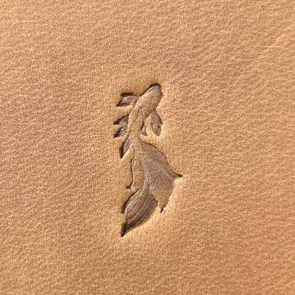 Flowing Fish leather stamp LT712 — single impression on veg-tan leather