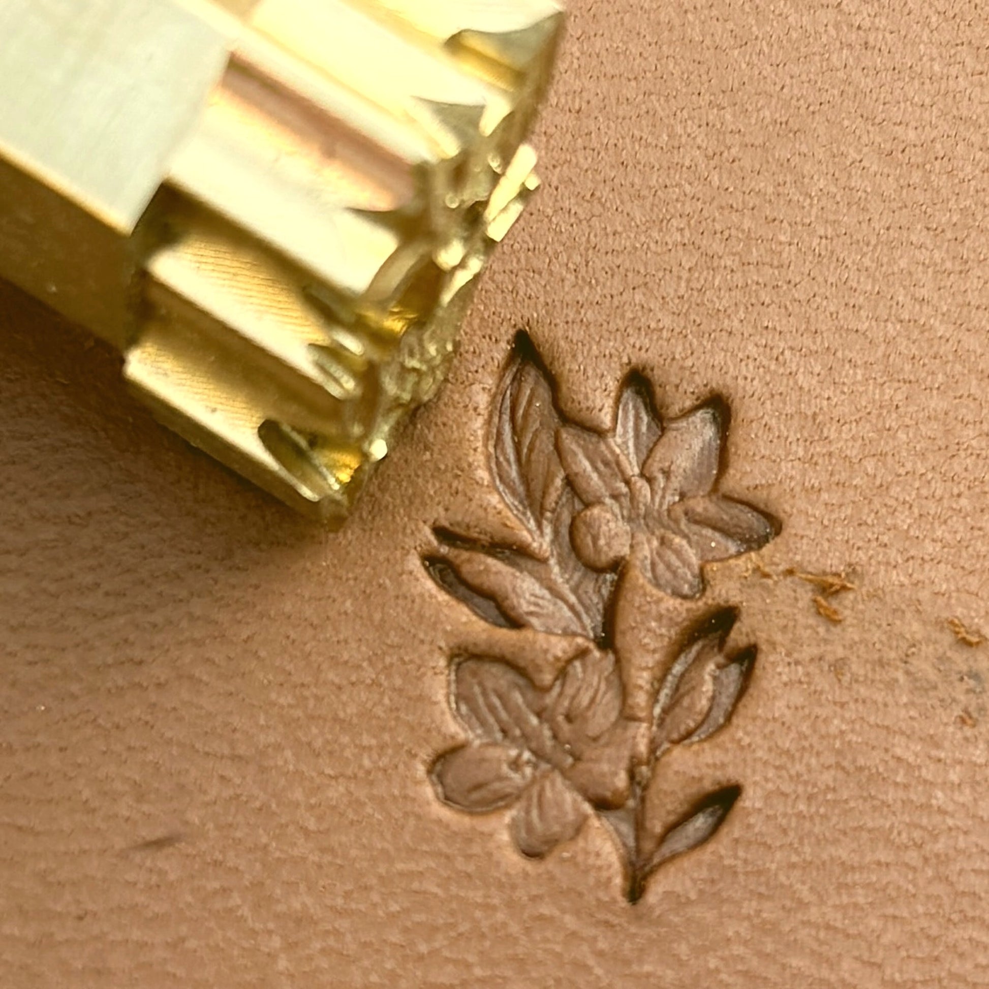 Petite Blossom Flower leather stamp LT713 — brass stamping tool with imprint on natural veg-tan leather