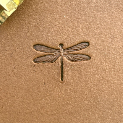 Dragonfly leather stamp LT715 — single impression on veg-tan leather