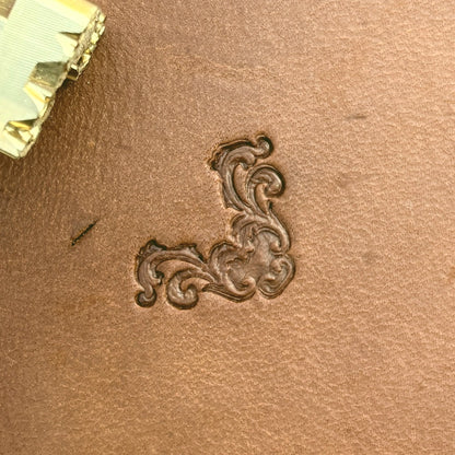 Ornate Flourish leather stamp LT716 — single impression on veg-tan leather