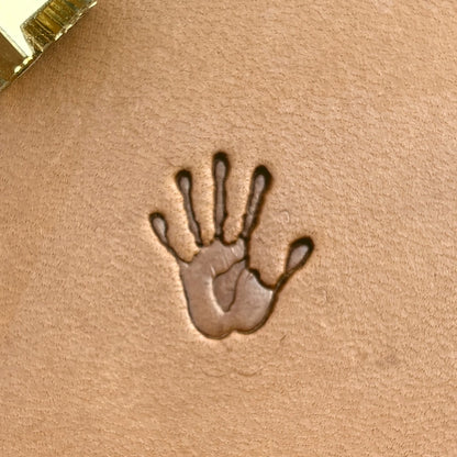 Handprint leather stamp LT718 — single impression on veg-tan leather