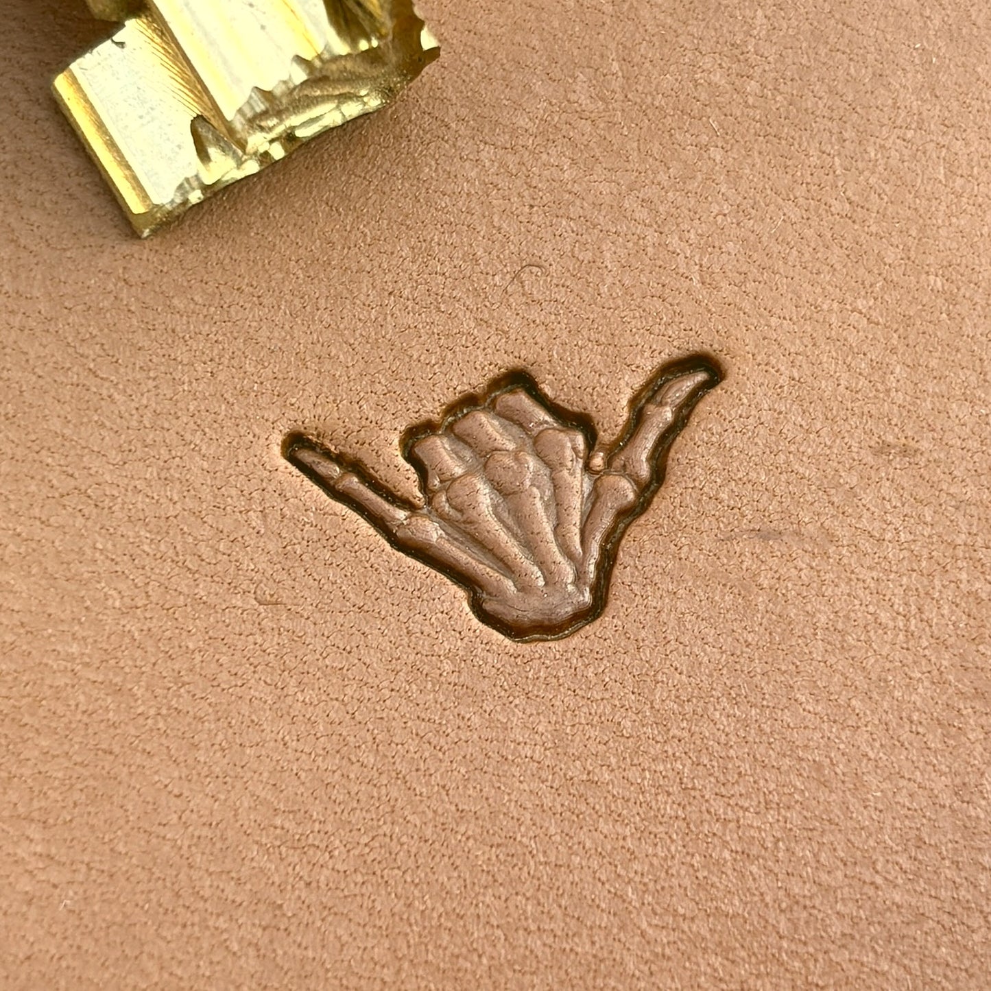 Shaka Hand Skull leather stamp LT719 — pattern imprint on veg-tan leather