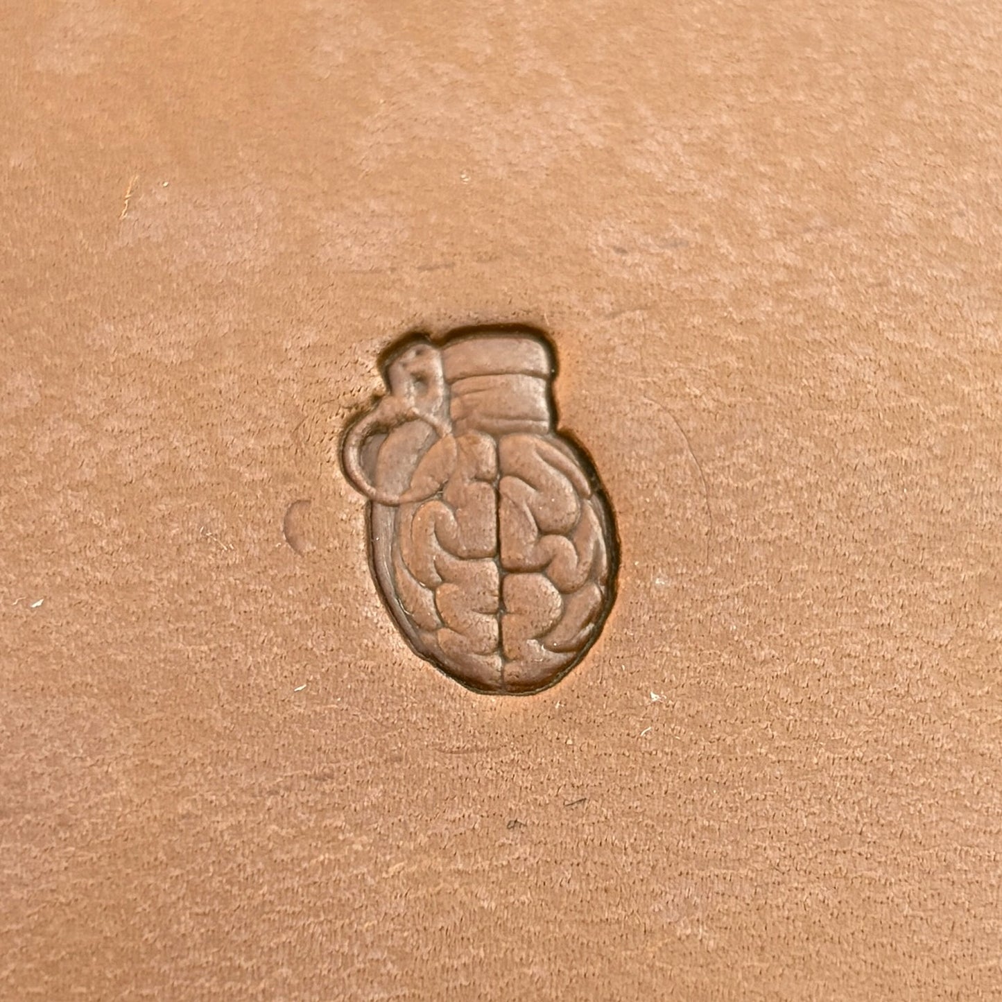 Brain Grenade leather stamp LT722 — pattern imprint on veg-tan leather