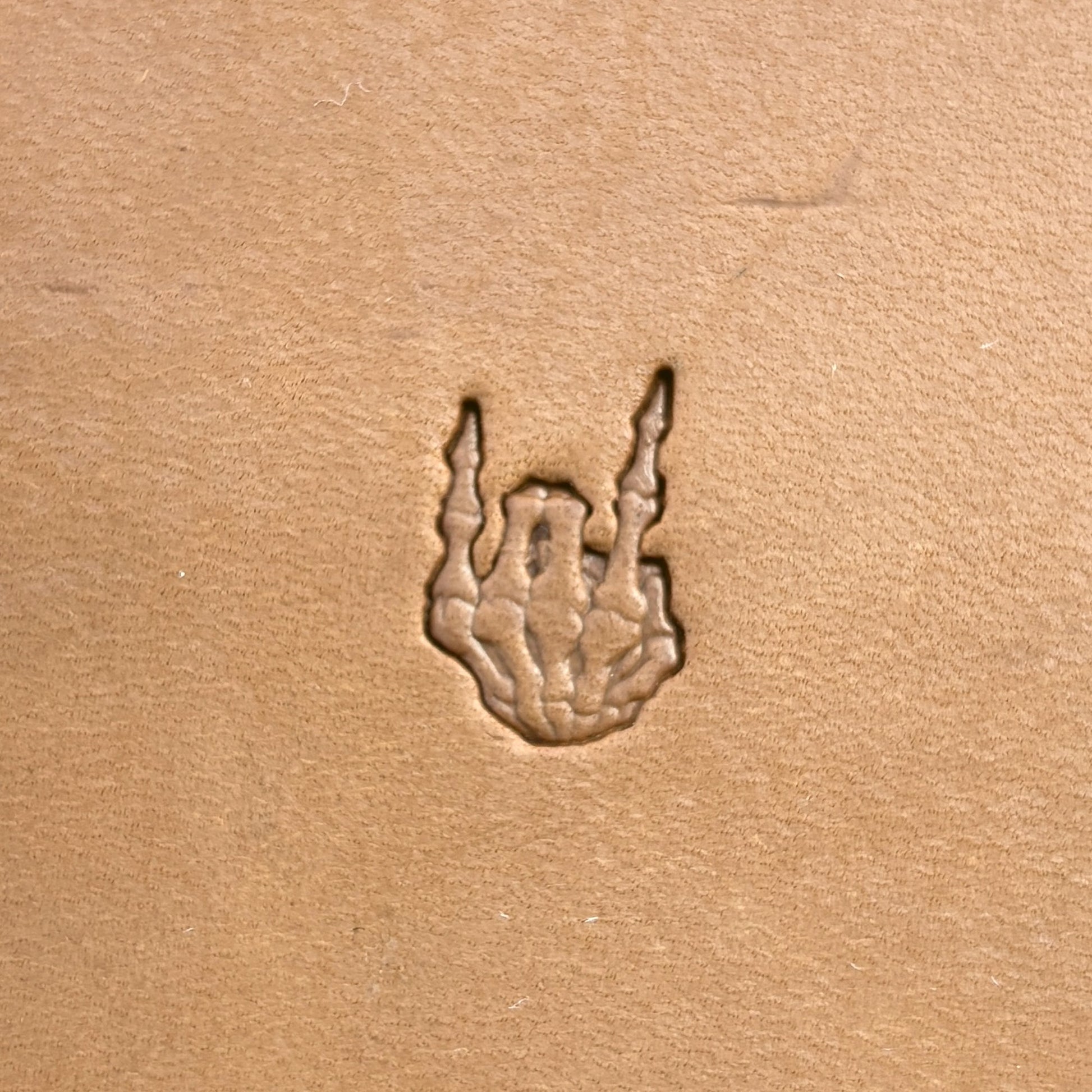 Devil Horns Hand Skull leather stamp LT723 — single impression on veg-tan leather