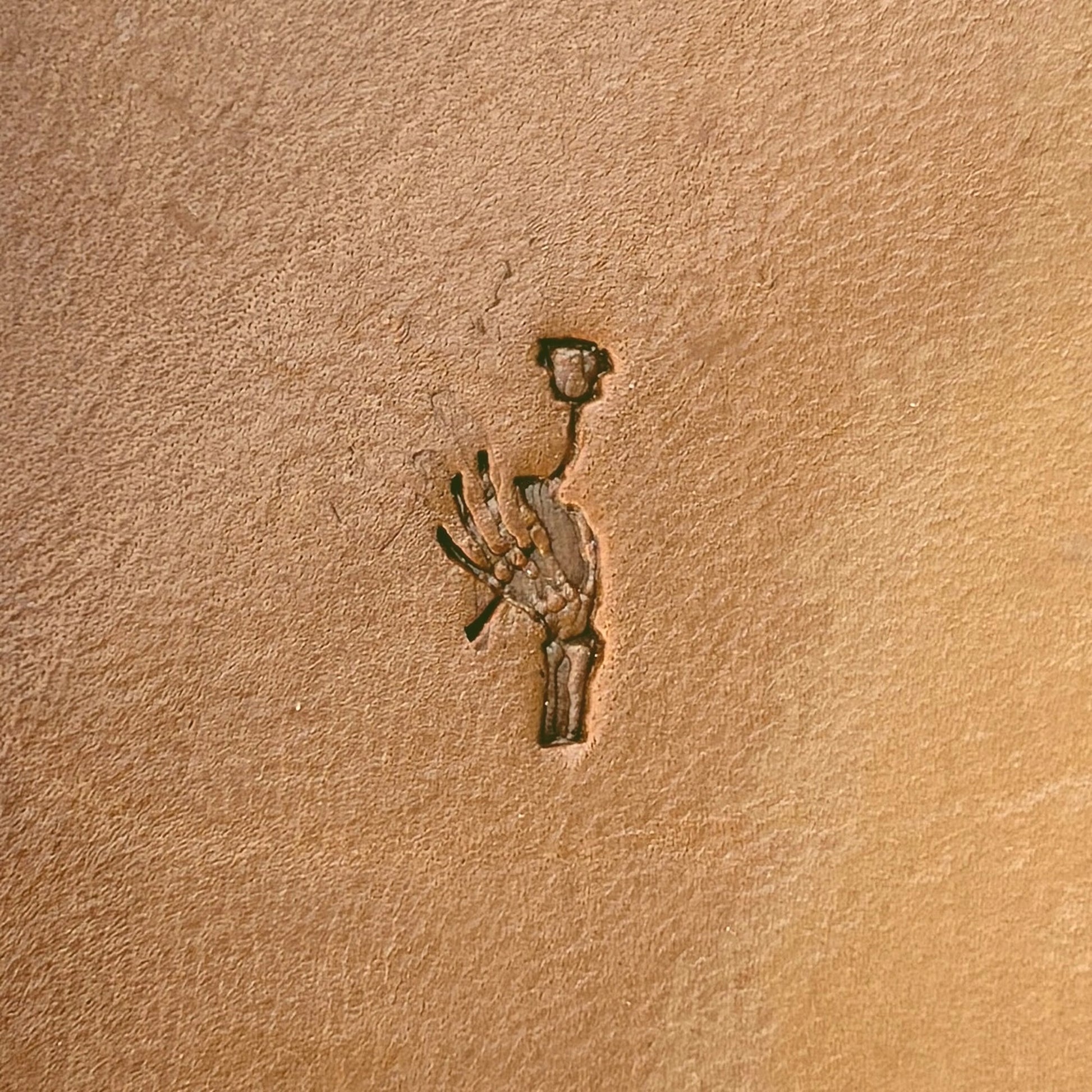 Skeleton Hand and Flower leather stamp LT726 — single impression on veg-tan leather