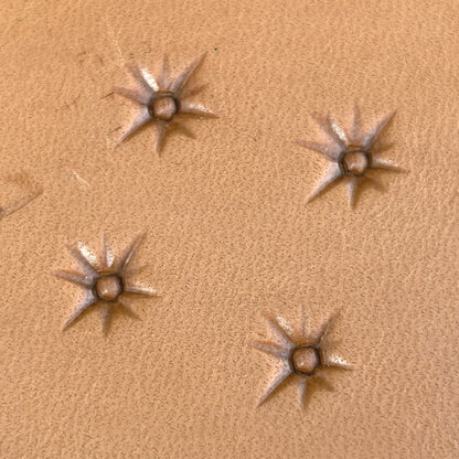 Starburst leather stamp LT743 — pattern imprint on veg-tan leather