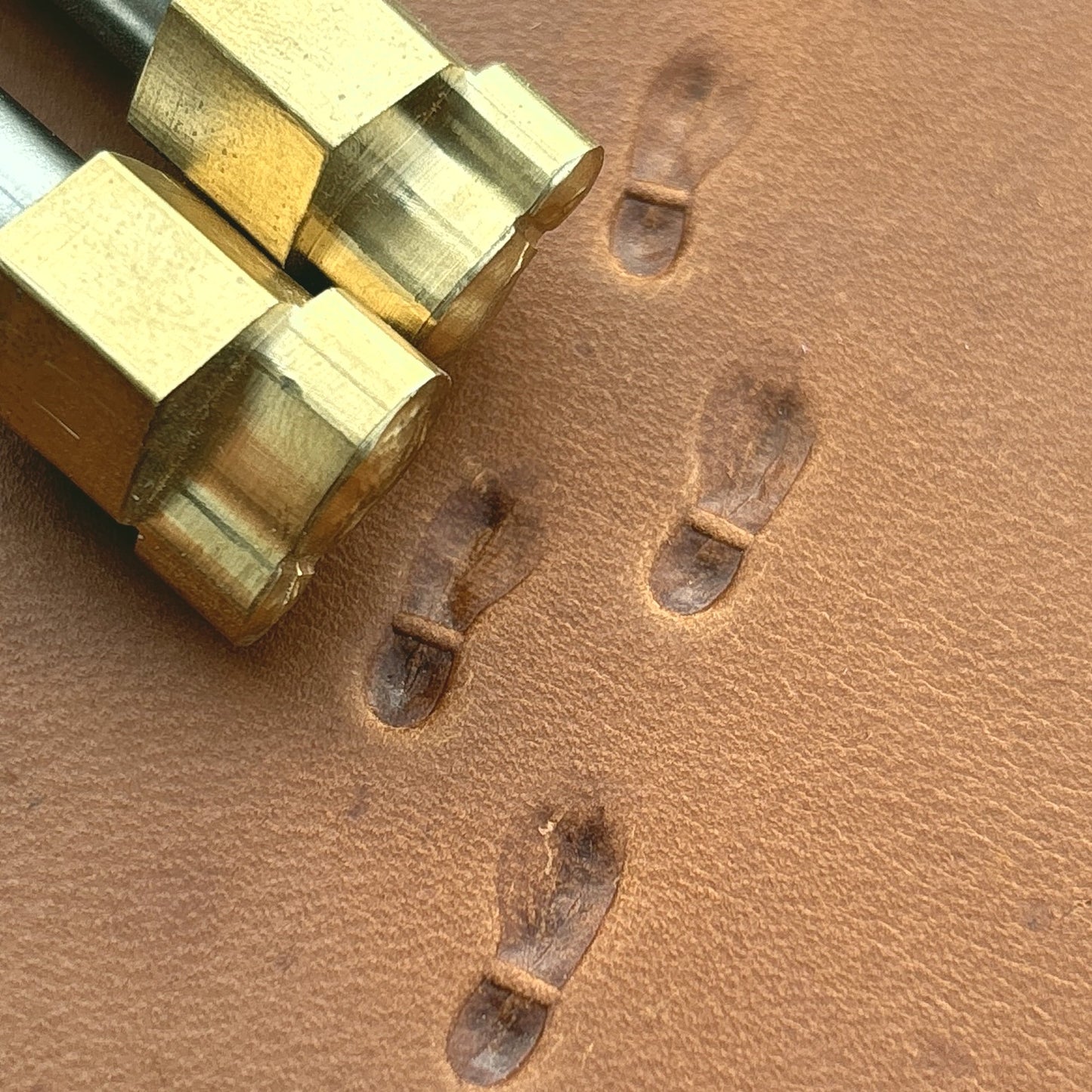 Shoe Footprint leather stamp LT745 — brass stamping tool with imprint on natural veg-tan leather