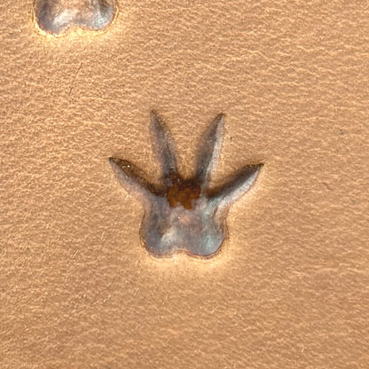 Rat Tracks leather stamp LT746 — single impression on veg-tan leather