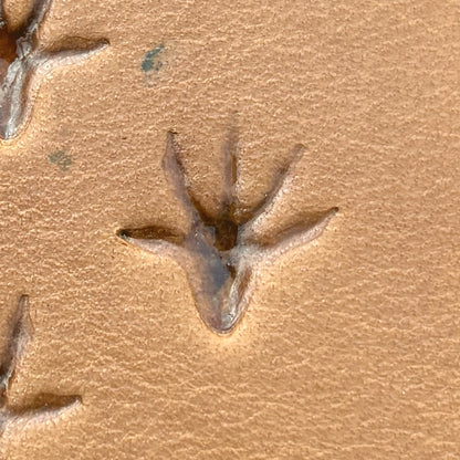 Rat Hind Tracks Footprint leather stamp LT747 — single impression on veg-tan leather