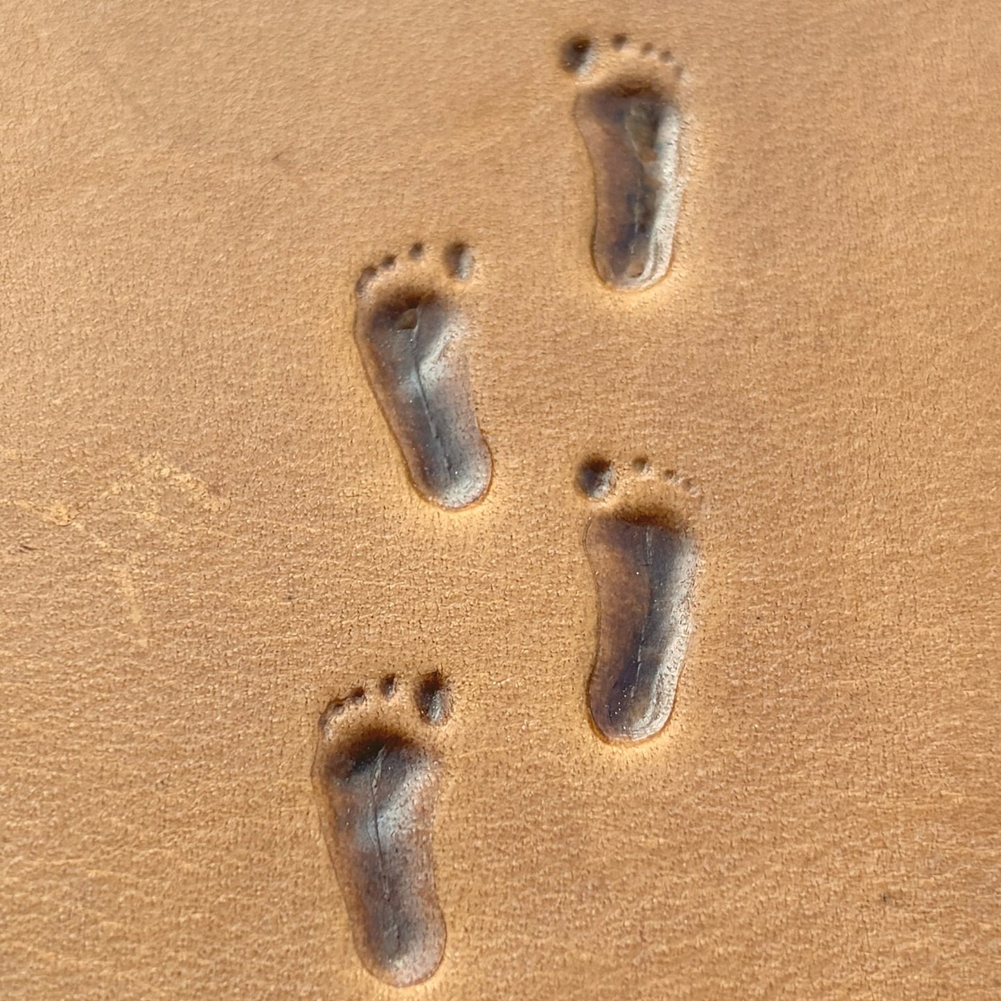 Bare Footprint leather stamp LT748 — pattern imprint on veg-tan leather